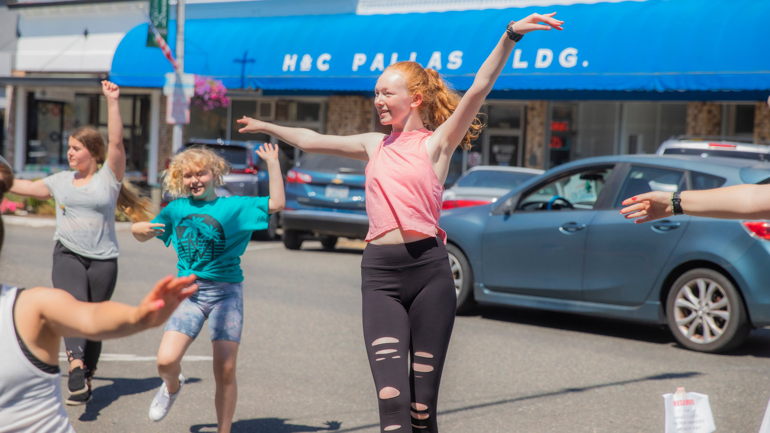 Dancers move to music outside the Southwest Washington Dance Center in Chehalis on Saturday.